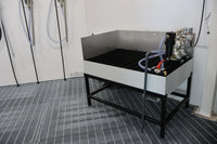 Spilltråg för spilloljeuppsamling